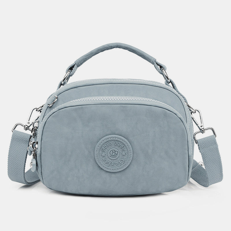Wasserdichte, leichte Umhängetasche mit mehreren Taschen