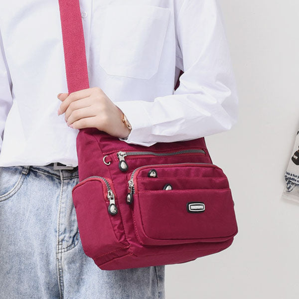 Wasserdichte Umhängetasche aus Nylon mit mehreren Taschen