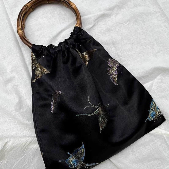 Schwarze und goldene Schmetterlingshandtasche für Damen, dicke Jacquard-Rattantasche