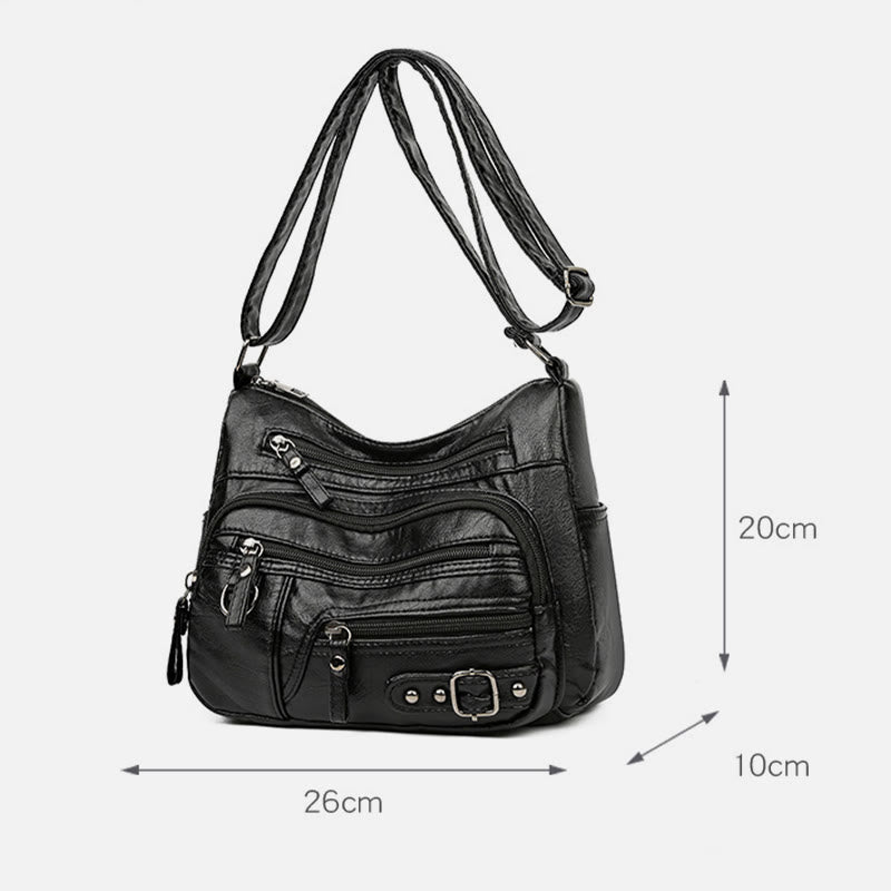 Minimalistische Ledergeldbörse mit mehreren Taschen für Damen. Organisierte Umhängetasche