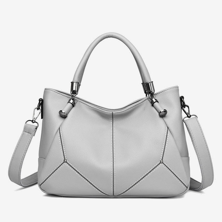Weiche Lederhandtasche für Damen, verstellbarer breiter Riemen, minimalistische Umhängetasche