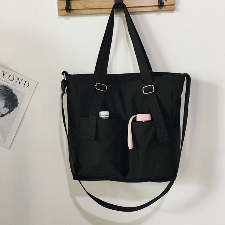 Große Tragetasche aus Canvas mit mehreren Taschen, funktionale Umhängetasche