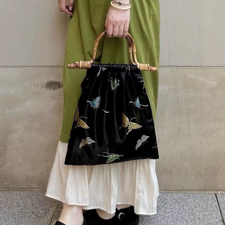 Schwarze und goldene Schmetterlingshandtasche für Damen, dicke Jacquard-Rattantasche