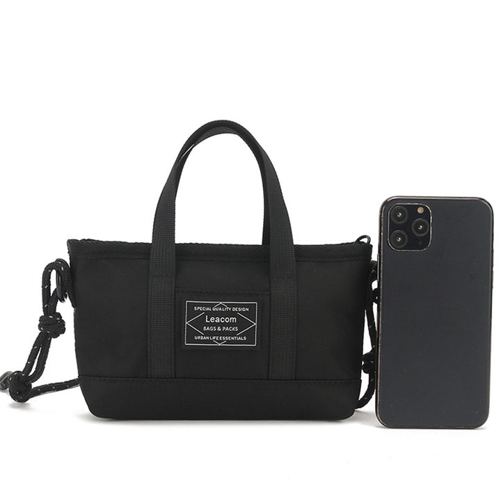 Kleine schwarze Retro-Umhängetasche für Unisex mit Henkel oben