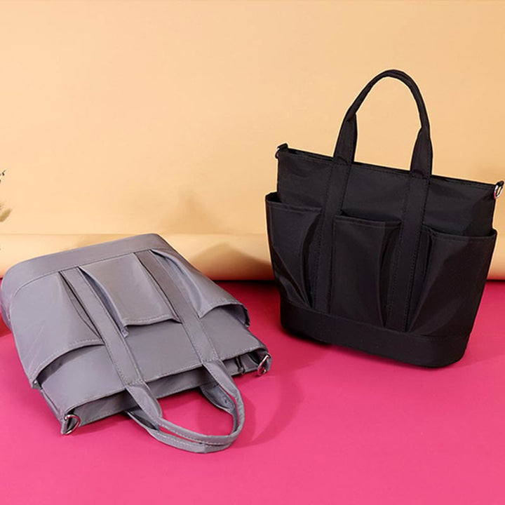 Tragetasche für Damen, minimalistische, wasserdichte Umhängetasche aus Oxford-Gewebe in Lila