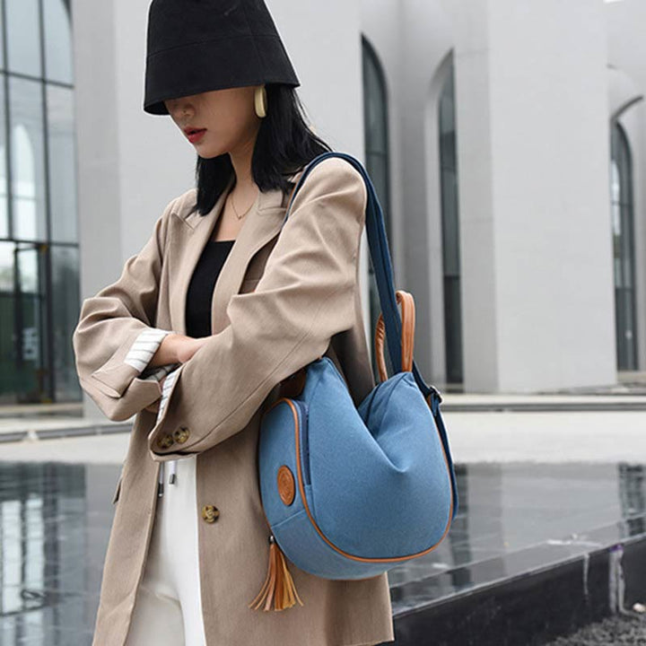 Multifunktionaler Damen-Rucksack mit Quastendekor, tragendem Canvas, Reise-Tagesrucksack