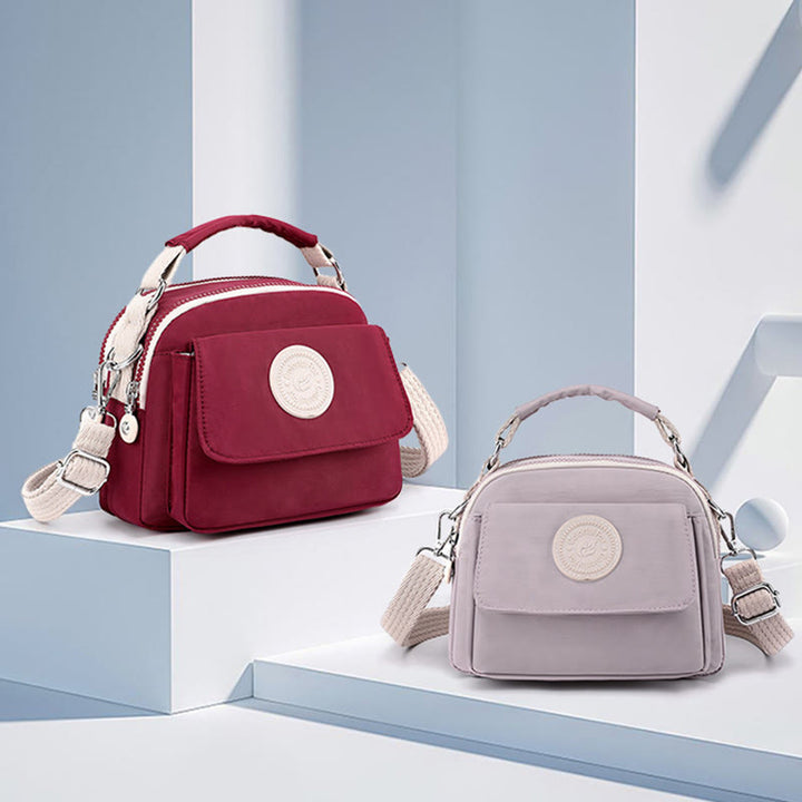 Tasche mit Griff oben für Damen, einfache, tragbare Umhängetasche mit Spritzschutz