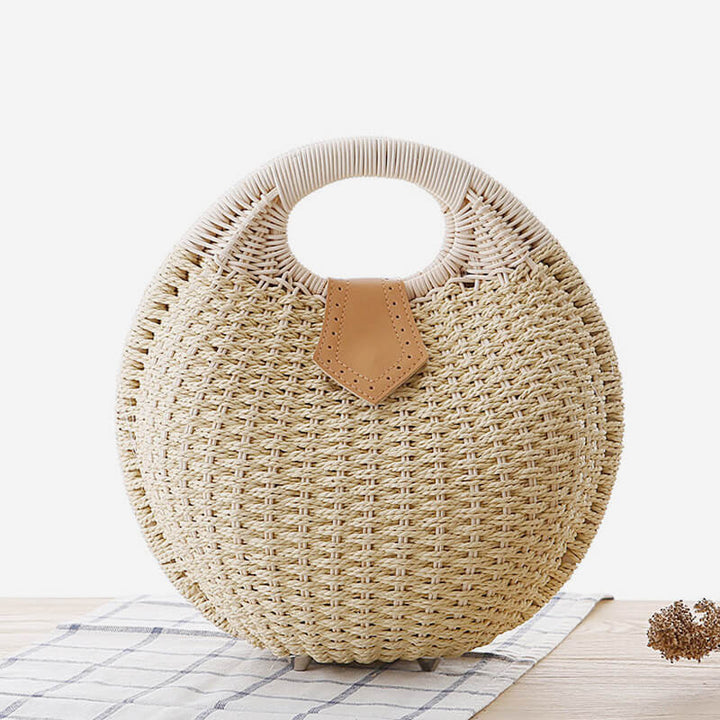 Lässige, runde Rattan-Handtasche